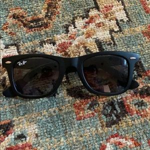 Black sunglasses definitely not ray bans